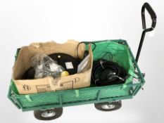 A green metal garden trolley and a wall paper stripper