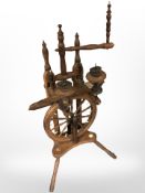 An antique spinning wheel CONDITION REPORT: condition issues and historic wood worm