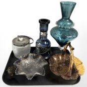 A carnival glass bowl, mallet shaped bottle with white metal mounts, amber glass basket, a vase,