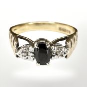 A 9ct gold sapphire and diamond ring, size N CONDITION REPORT: 2.