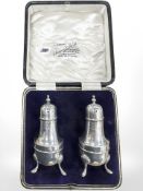 A pair of silver sifters, Birmingham marks, boxed CONDITION REPORT: 70.