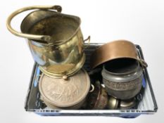 A brass coal bucket, assorted planters and other metal vessels.