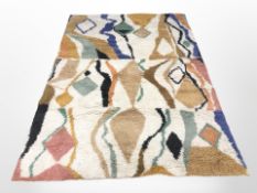 A modern wool rug, 160 cm x 225 cm.