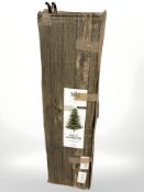 An artificial Christmas tree in box,