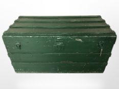 A vintage painted wooden bound trunk, width 100 cm.