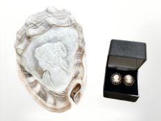A carved cameo shell and a pair of cameo earrings