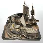 A model galleon, silver plated serving platters, Indian mother of pearl inlaid trinket box,