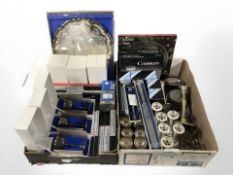 A group of silver plated goblets, bud vases, candlesticks, toast racks, boxed cutlery,