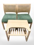 A pair of bergere chairs and beech magazine table.