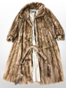 A lady's brown mink full length fur coat retailed by Otto Madsen, Copenhagen.