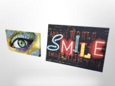 Two contemporary canvas prints 'Smile' and an eyeball, largest 100 cm x 70 cm.