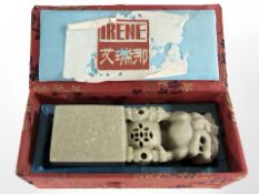 A Chinese carved soapstone seal in box.