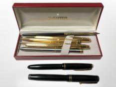 A Sheaffer pen box containing Swan fountain pen with 14ct gold nib, Raja fountain pen,