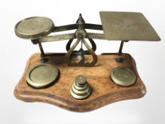 A set of Victorian letter scales with weights.