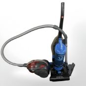 Two Hoover vacuum cleaners