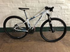 A Cannondale Trail 6 mountain bike.
