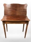 A 19th century mahogany tea table,