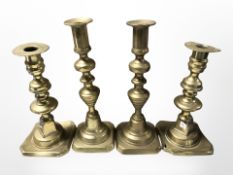 Two pairs of Victorian brass candlesticks, tallest 22 cm.