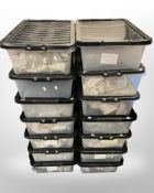 Fourteen various plastic storage boxes with lids,