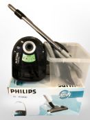 A Nilfisk vacuum cleaner and accessories etc