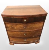 A mahogany bow-fronted four drawer chest,