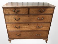 A George III mahogany five drawer chest with brass swan neck handles,