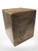 An antique wooden tea caddy.