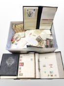 A large quantity of stamps, loose and in albums, postcards, etc.