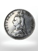 An 1887 silver double florin.