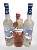 Two bottles of Grey Goose vodka 700ml, and a bottle of Gordon's premium pink gin 70cl.