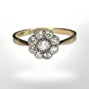 An antique 18ct gold diamond cluster ring,