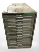 An enameled metal twelve drawer index chest, height 41 cm.