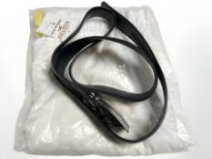 A pair of Pacific Merchants jogging bottoms, size L, in cellophane wrapping, and a leather belt.