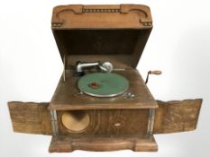 An oak cased table top gramophone.