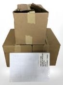 A box of A4 exercise paper and a box of brown paper envelopes