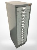 An enamelled metal fifteen drawer index chest,