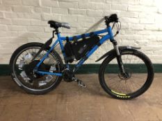 A Voodoo mountain bike with electric power pack
