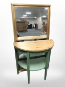 A painted pine demilune occasional table and a gilt rectangular mirror.