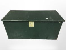 A green painted wooden storage box, width 90 cm.