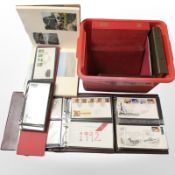 Eight albums of first day covers.