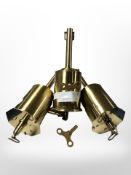 Three reproduction brass clockwork spit jacks.