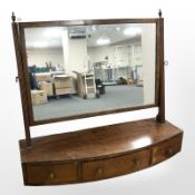 A Victorian mahogany bow front dressing table mirror, width 69 cm.