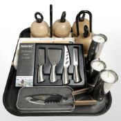 A group of Danish kitchen wares, boxed cheese board, salt and pepper grinders, candle holders,