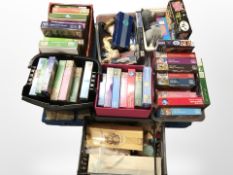Approximately seven boxes containing jigsaw puzzles, toys, games, etc.