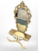 A reproduction gilt finish console table and mirror