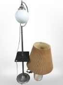 A chrome standard lamp and a ceramic table lamp.