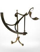 A brass cantilever scale, stamped 'Manufactured in Germany', height 58 cm.