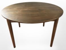 A G Plan teak extending circular dining room table, diameter 122 cm (closed),