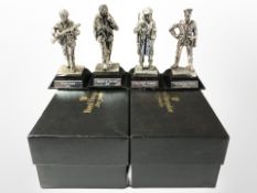 Four Royal Hampshire die cast metal military figures.
