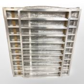Four aluminium racks, widest 97 cm.